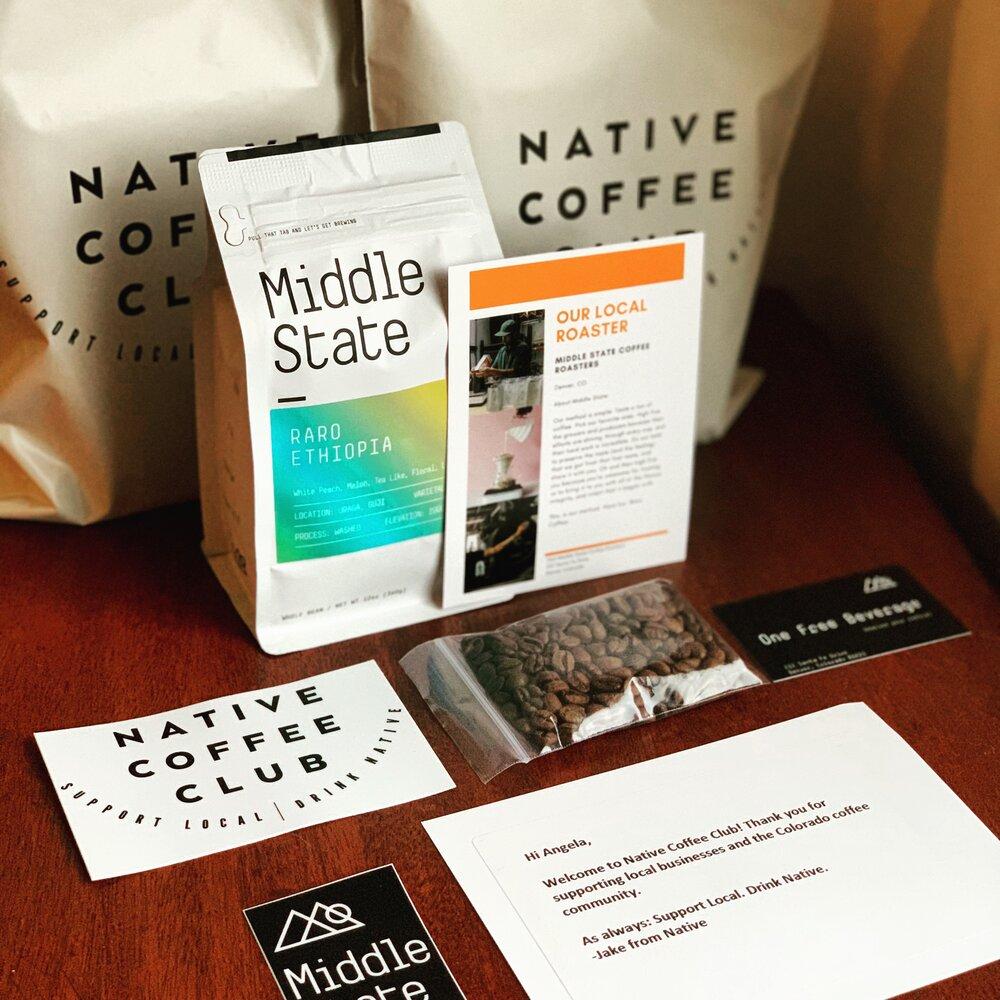 Decaf Coffee Club with a bag of specialty coffee from Middle State Coffee, free drink card, and merchandise
